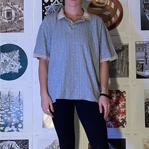 light blue polo shirt